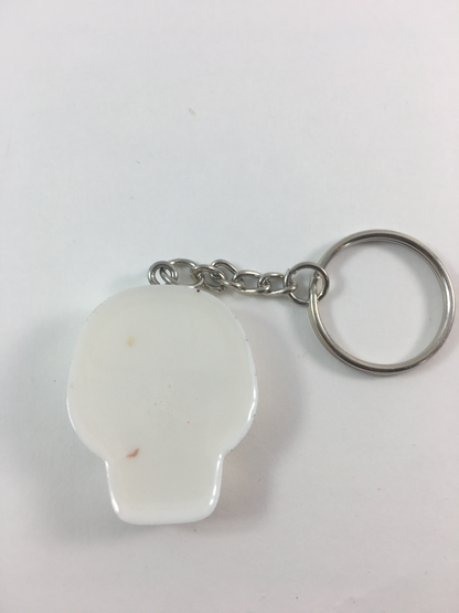 White Spooky Halloween Skull with Black Pearl Eyes Keychain